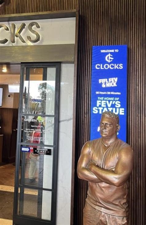 Bronze Fev statue of Brendan Fevola returns to Flinders St.